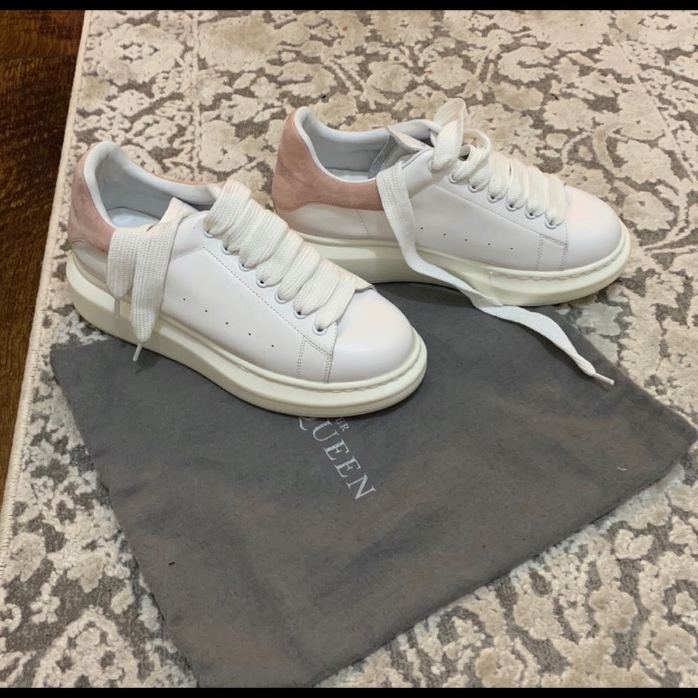 Brand new. Never worn. Comes with dust bag